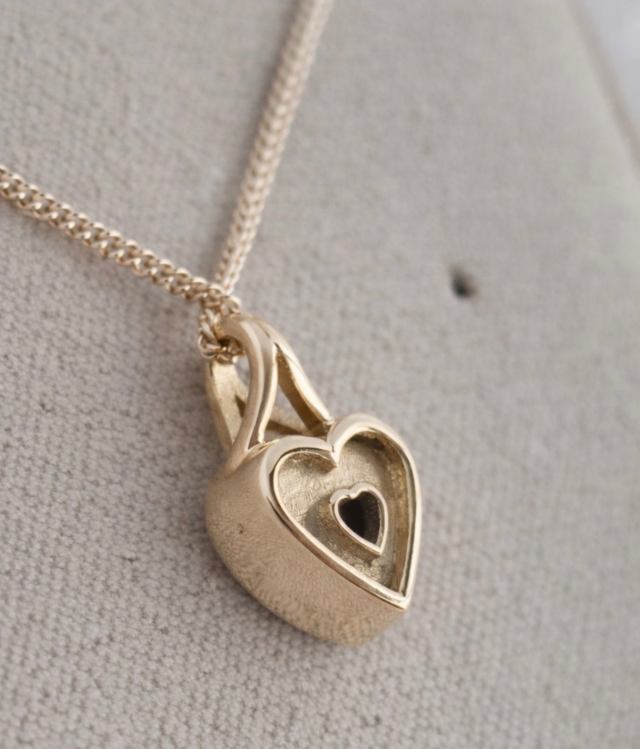 9K Gold Secretly Set Heart Pendant