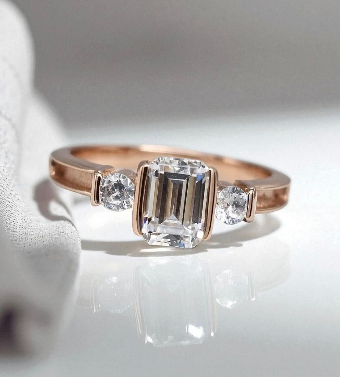 9k Gold Emerald Cut Solitaire Ring
