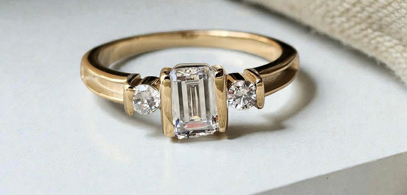 9k Gold Emerald Cut Solitaire Ring